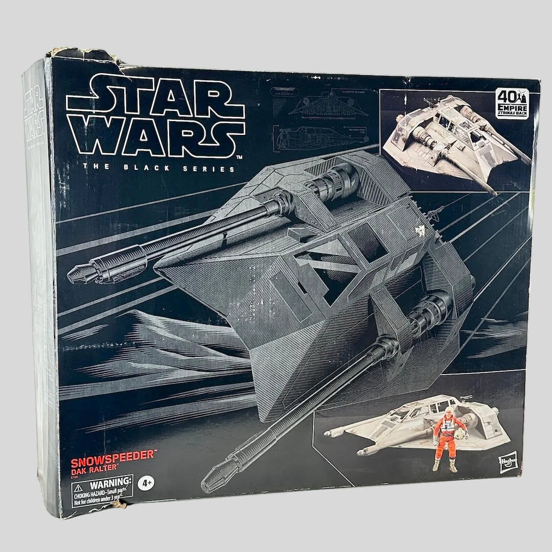 Star Wars Black Series Snowspeeder box with some wear on light background. 
