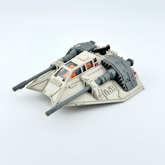 Diecast model of a Star Wars' Snowspeeder on a white background
