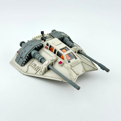 Diecast model of a Star Wars' Snowspeeder on a white background