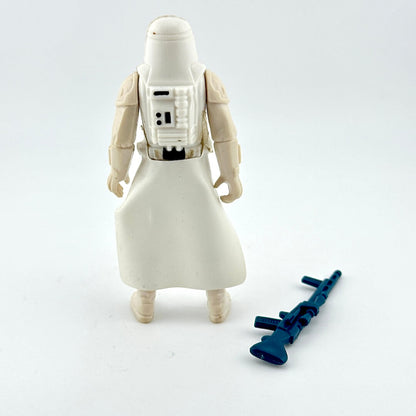 Action figure in a white costume with a blue weapon on a light gray background