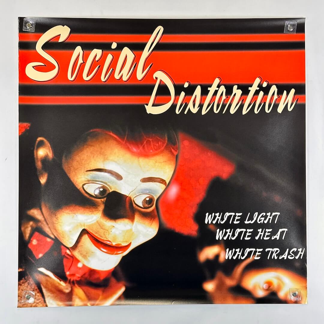 Promo poster for Social Distortion album with ventriloquist dummy as main image. 