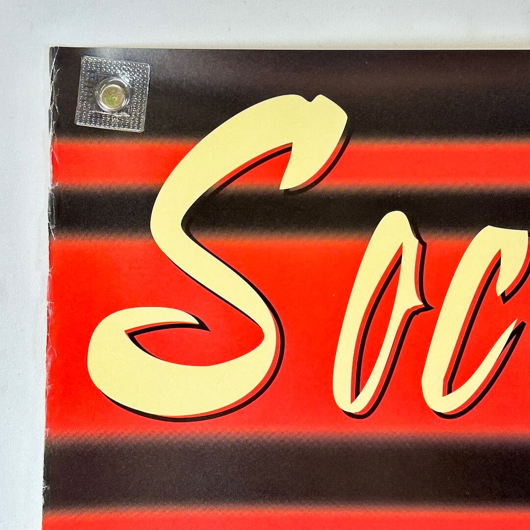 Top left corner with some wear to left edge.