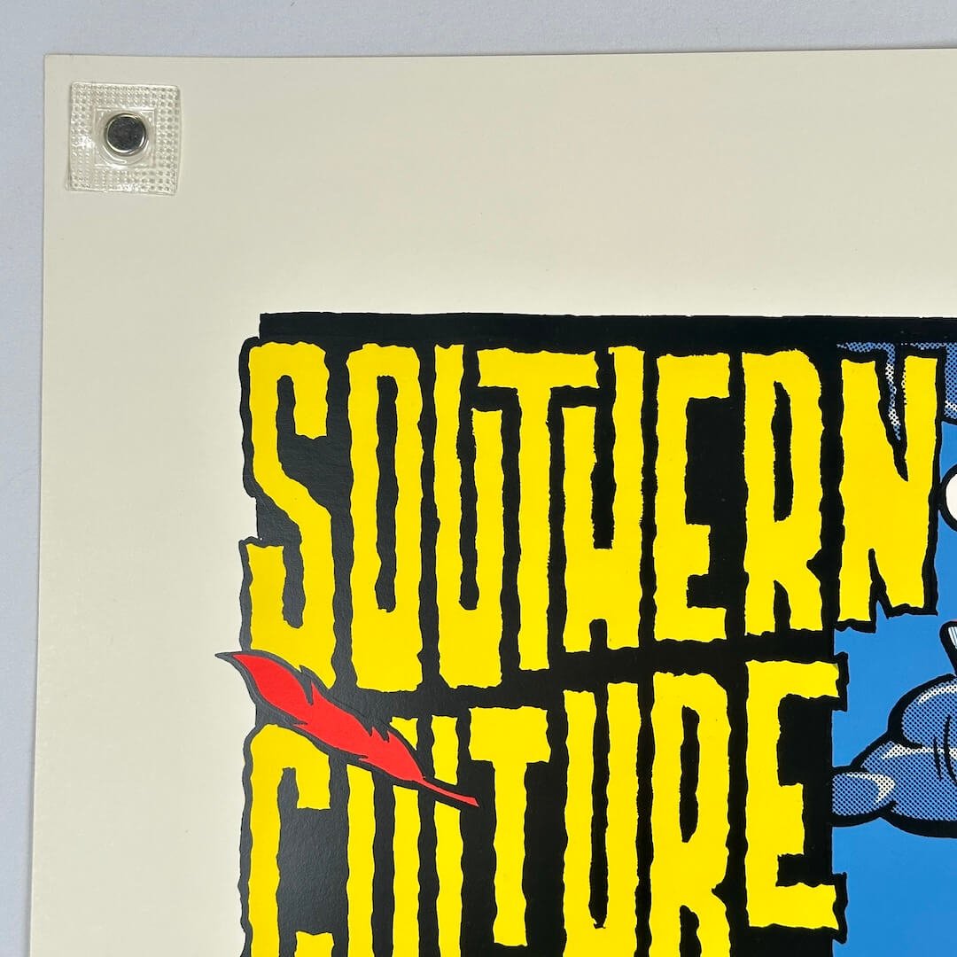 Top left corner of concert poster showing crisp edges and corner. 