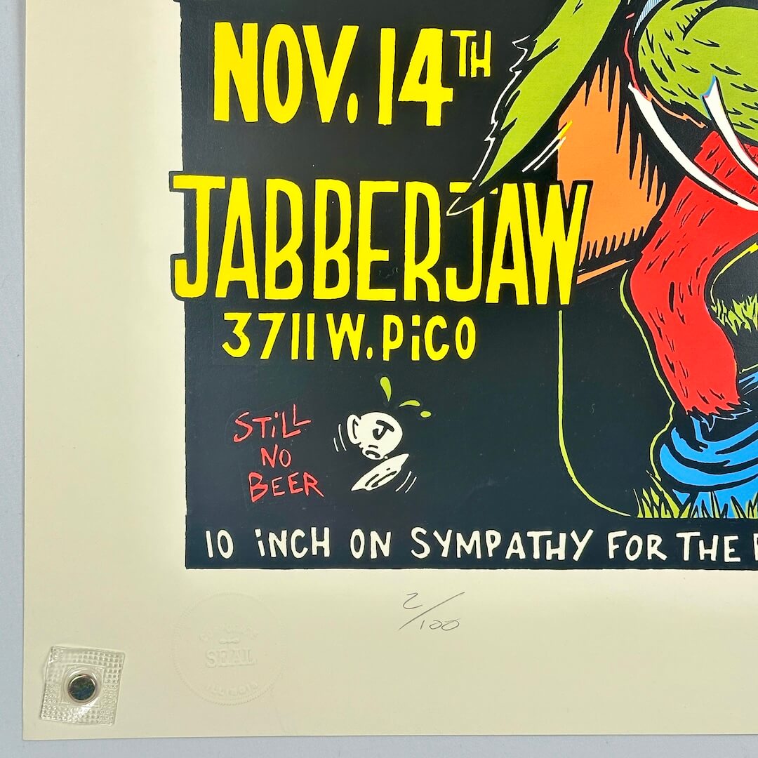 Bottom left corner of concert poster showing crisp edges and corner. 