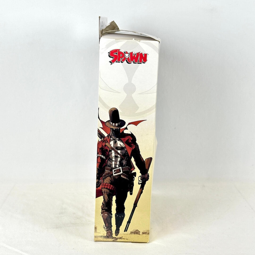 Side view of Spawn Gunslinger packaging with image of character under Spawn logo. 