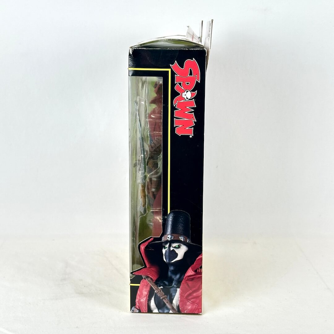 Side view of Spawn Gunslinger packaging with image of character under Spawn logo. 
