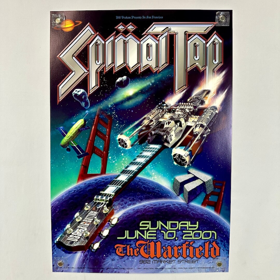 Spinal Tap concert poster with spaceship and guitar design on a space-themed background