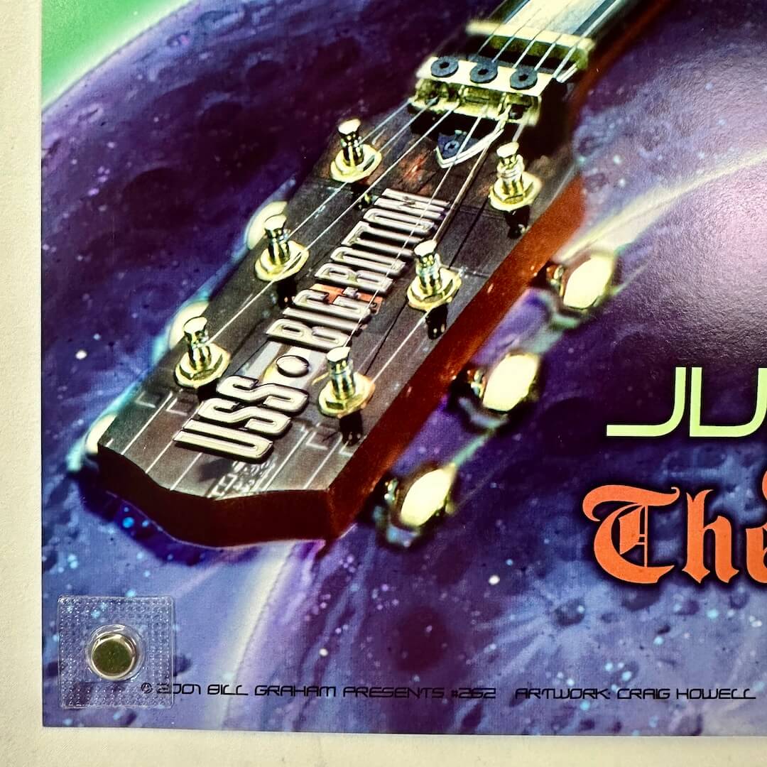 Bottom left corner of poster with crisp corner and clean edges. 