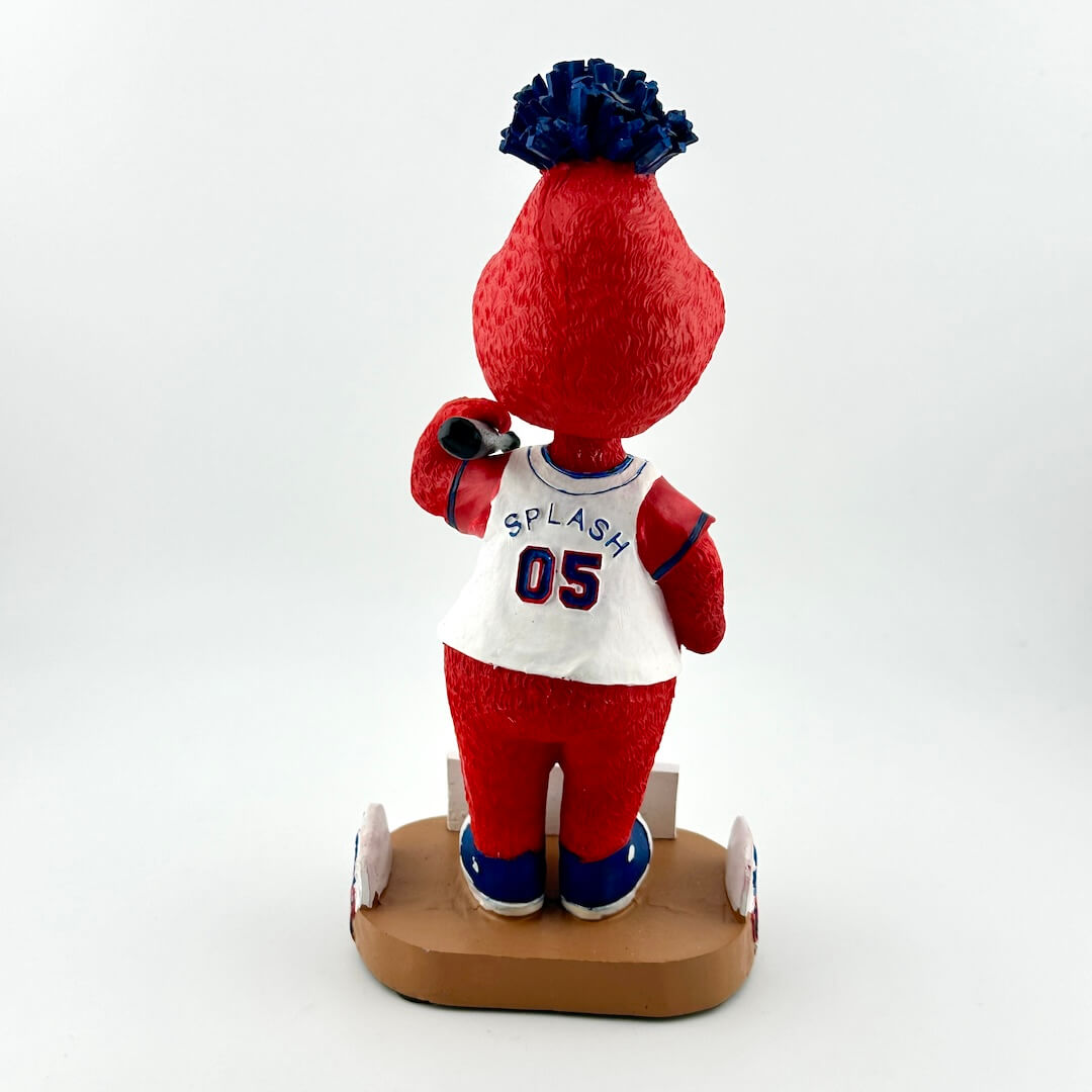 Red and blue figurine with a white shirt labeled 'Splash 05' on a white background