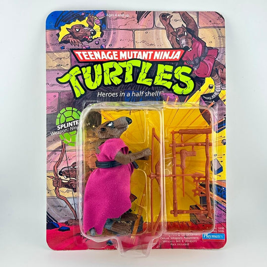 Toy figure in packaging with 'Teenage Mutant Ninja Turtles' branding on a colorful background