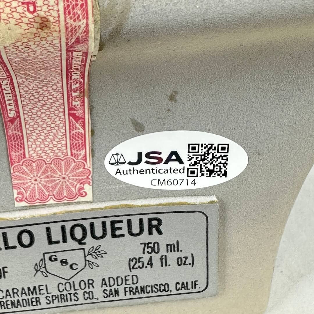 JSA authenticated label on a bottle of liquor with a QR code
