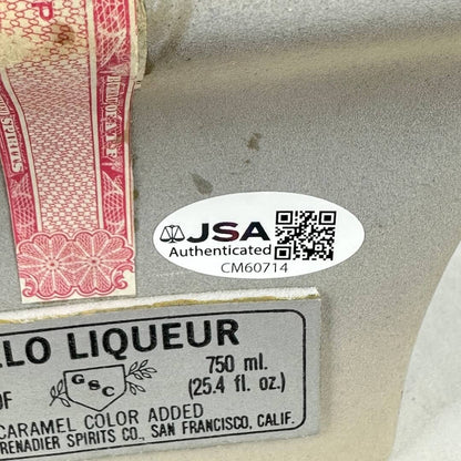 JSA authenticated label on a bottle of liquor with a QR code