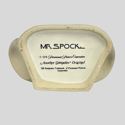 Decorative item with 'MR. SPOCK' branding on a white background