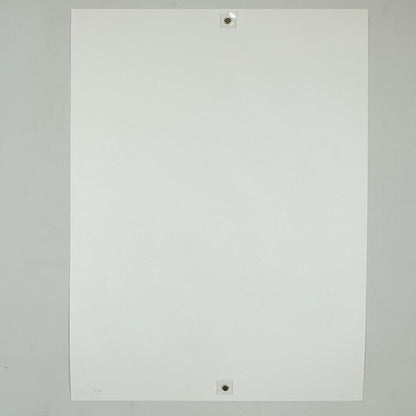Backside of white poster against white background. 
