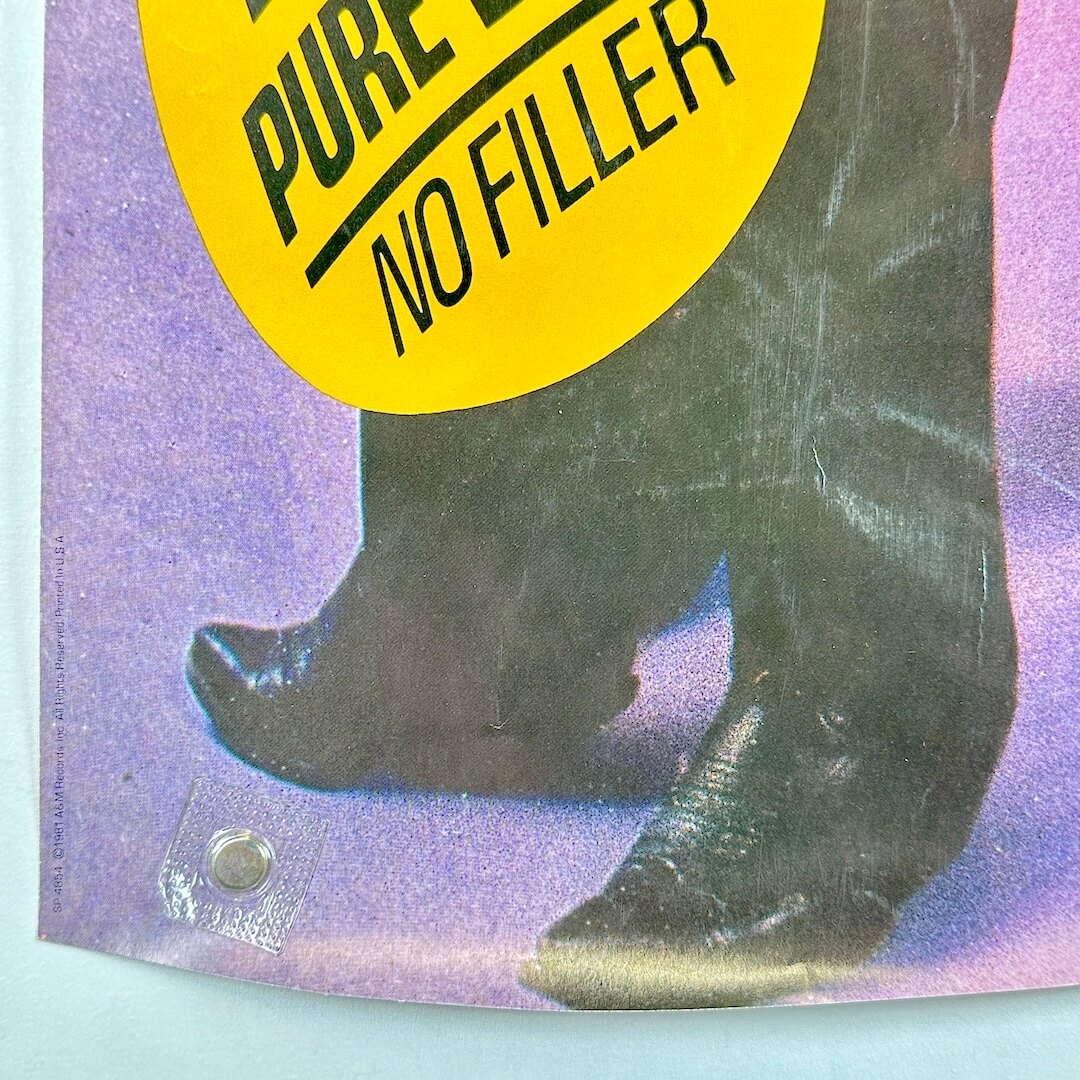 Bottom left corner of poster with good edges and light wear to face. 