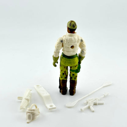 Action figure in green and white outfit with accessories on a white background