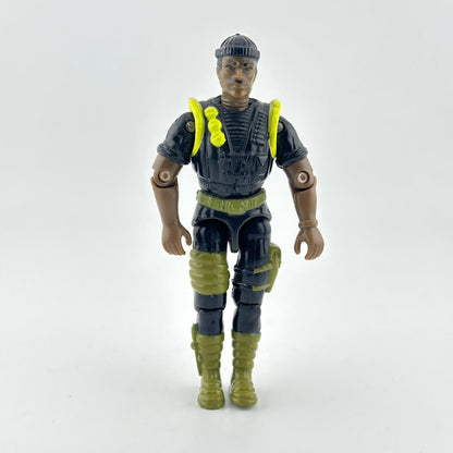 GI Joe action figure in black military outfit with green and yellow accents, photographed against white background. 