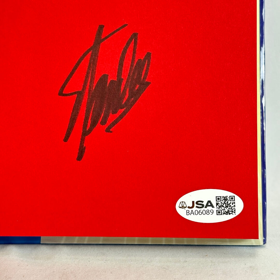 Close up of Stan Lee's signature and JSA sticker. 