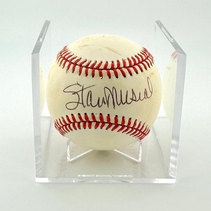 Signed baseball in a clear display case on a white background