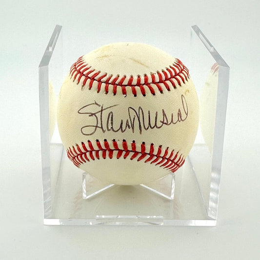 Signed baseball in a clear display case on a white background