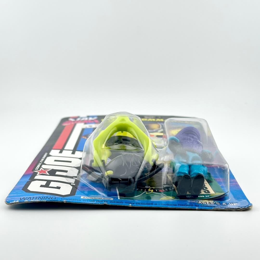 Toy figure in packaging with G.I. Joe branding on a white background
