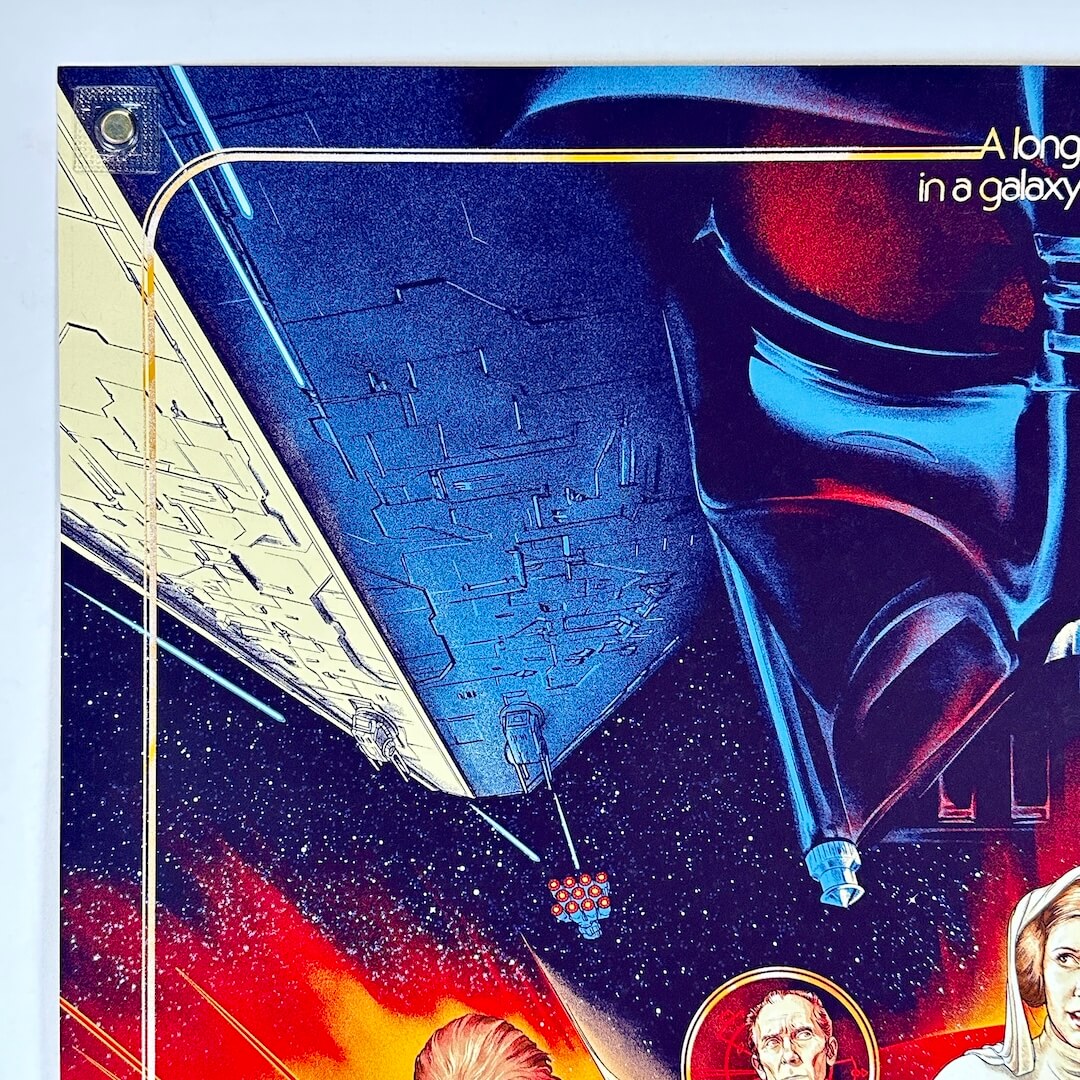 Top left corner of poster with no visible damage. 