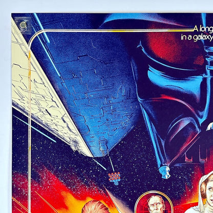 Top left corner of poster with no visible damage. 