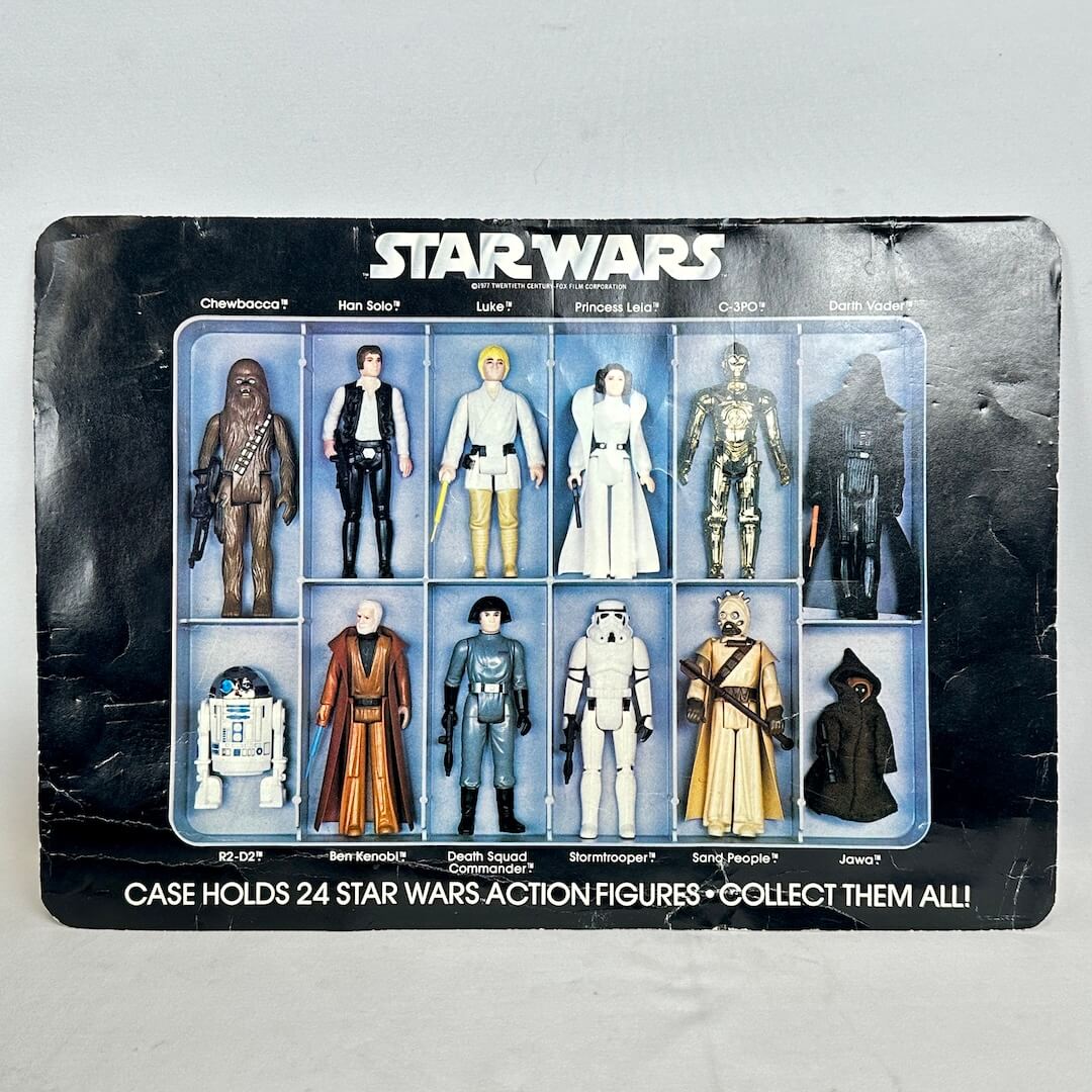 Star Wars action figure collection packaging with figures displayed on a gray background