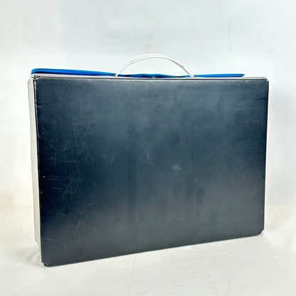 Black pleather action figure carrying case on white background.  