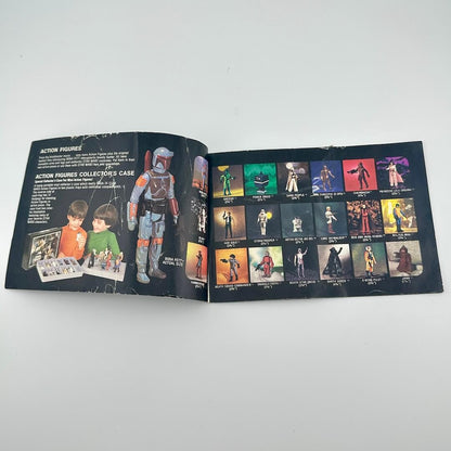 Open book showing action figures and collectible items on a white background