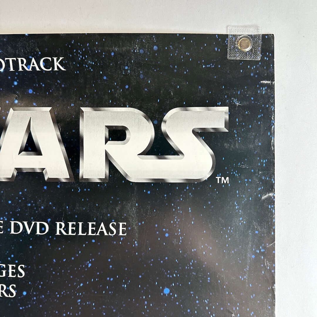 Top right corner of poster with some wear to edge. 