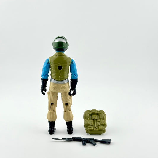 Back of GI Joe action figure with accessories against white background. 