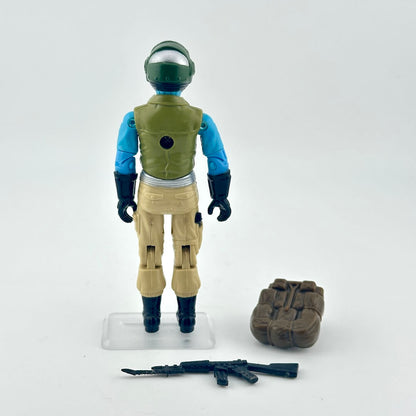 Toy figure in space suit with helmet and weapon on a white background