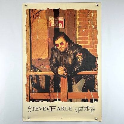 Poster of a man in sunglasses and leather jacket leaning against a wall.