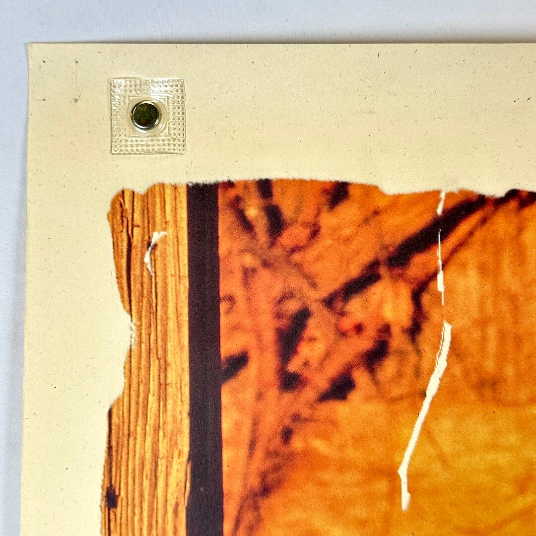 Top left corner with pin holes 