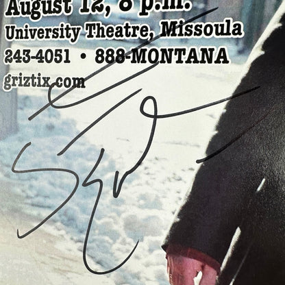 Close up of Steve Earle signature in black marker placed below second date info, by his right arm.