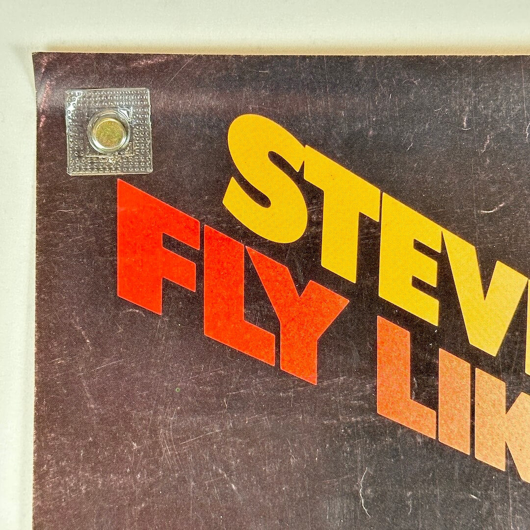 Top left corner of poster with good condition.