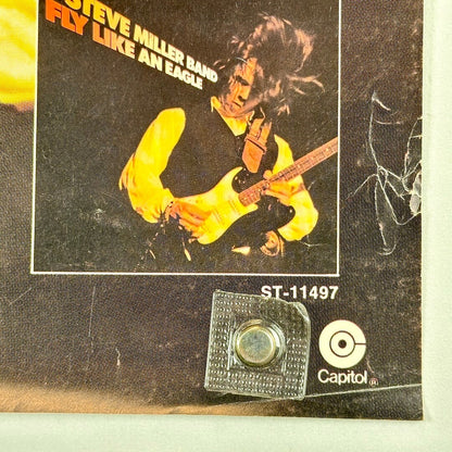 Bottom right corner with crease and edge wear.