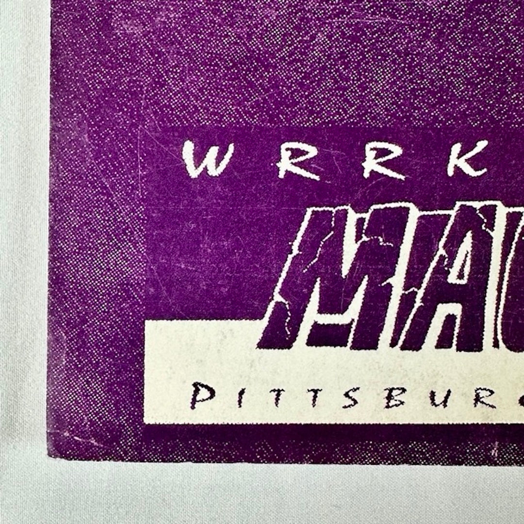 Purple poster with white WRRK radio station logo. 