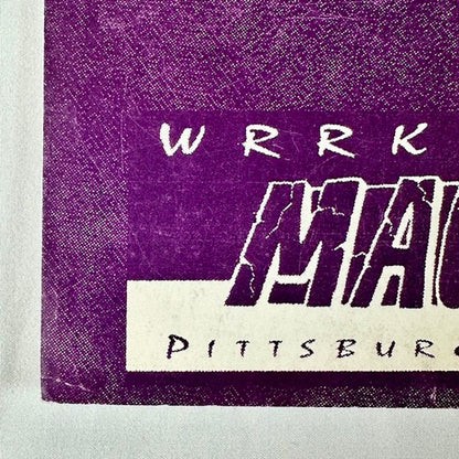 Purple poster with white WRRK radio station logo. 