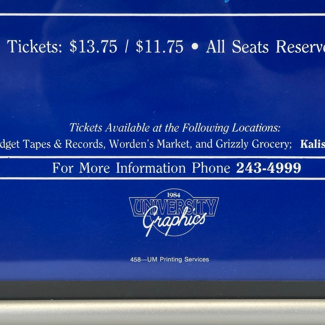 Close up of ticketing info in white text & 1984 University Graphics logo in white.