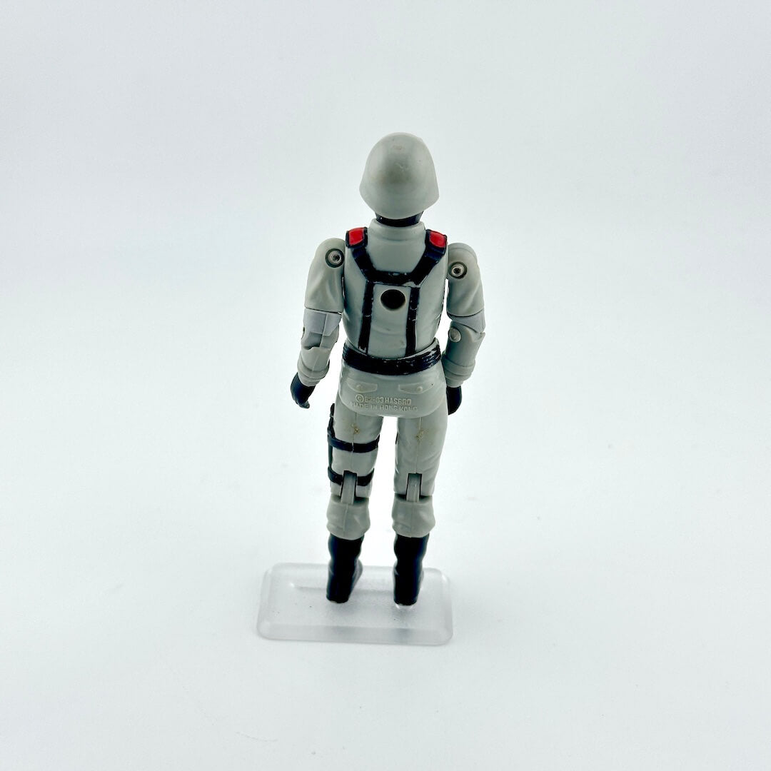 GI Joe action figure in gray flight suit against white background. 