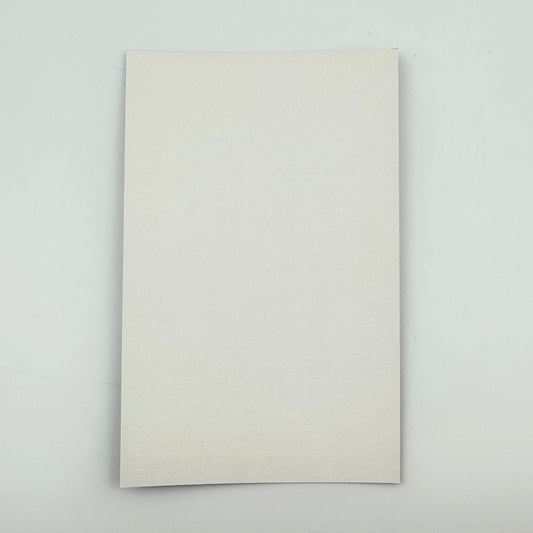 Backside of laminate showing no graphics or damage. 