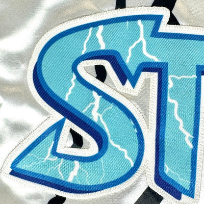 Blue logo lettering on front chest