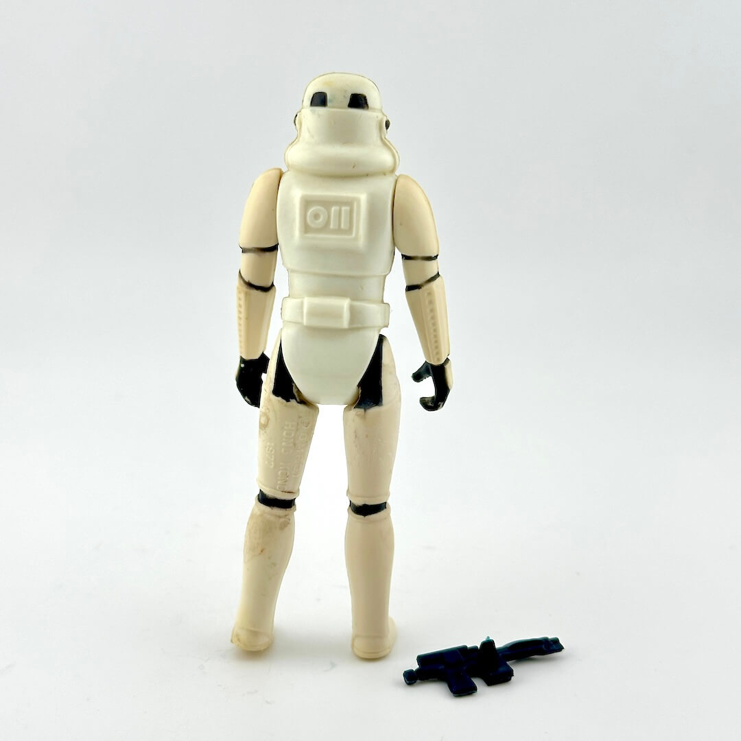 Star Wars action figure of a stormtrooper on a white background
