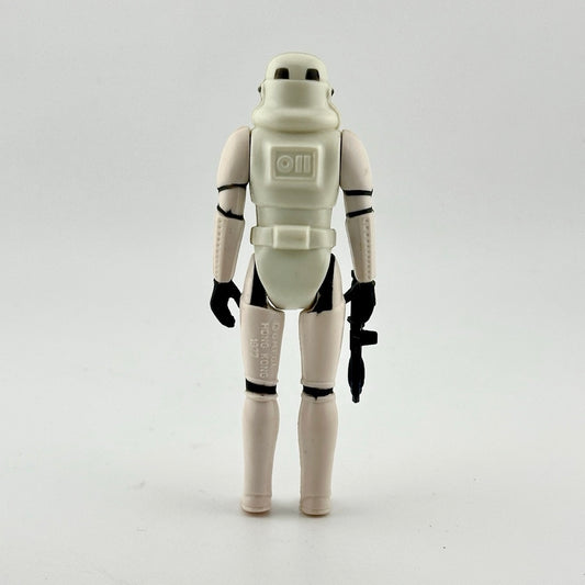 White armor clad action figure in white and black helmet, holding black blaster.