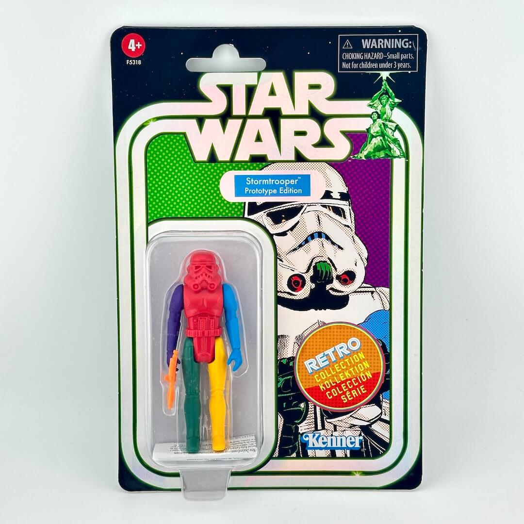 Star Wars Stormtrooper action figure with various colored body parts still sealed in original blister packaging. 