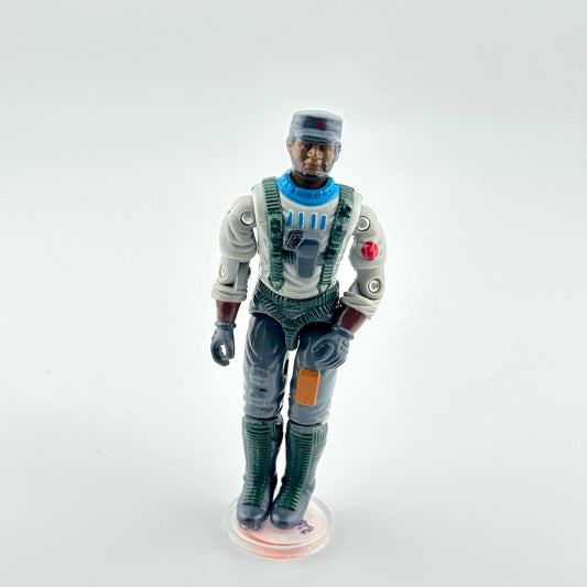 G.I. Joe action figure against white background. 