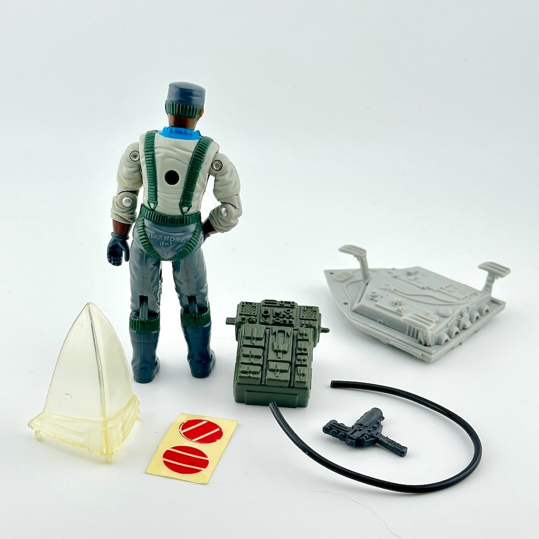 Toy figure with accessories on a white background