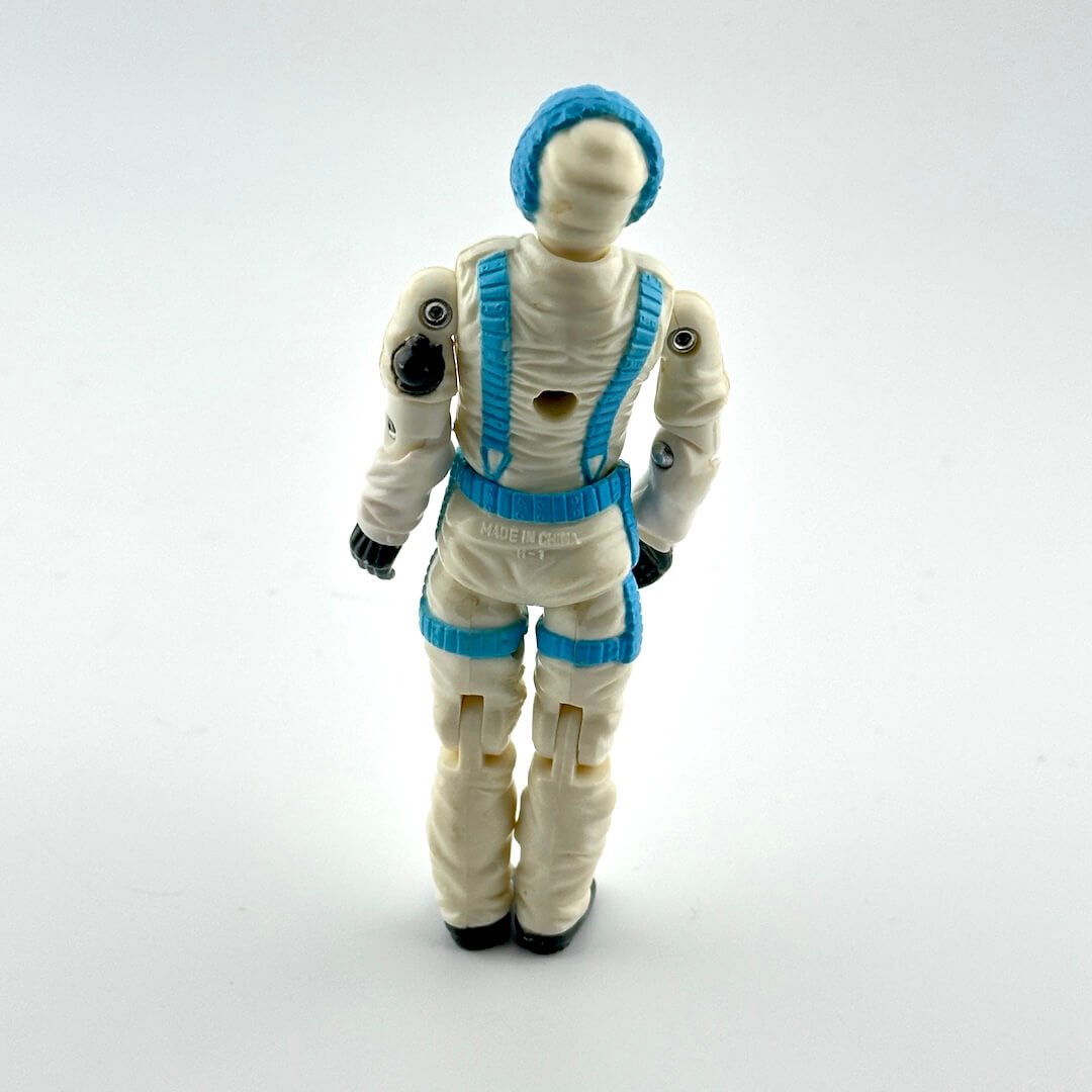 Toy figure in a white and blue space suit on a white background